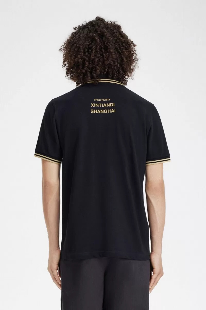 fred perry shanghai m12 mens polo shirt black champagne