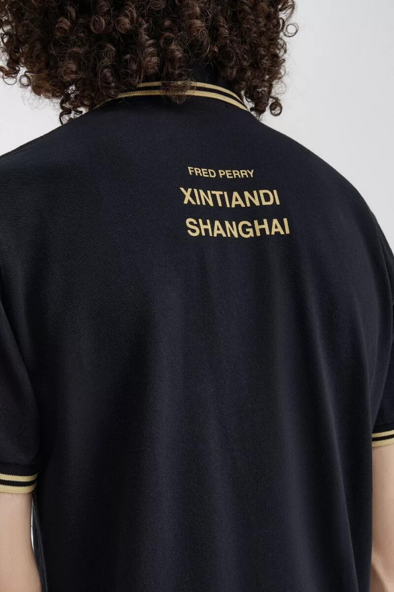 fred perry shanghai m12 mens polo shirt black champagne
