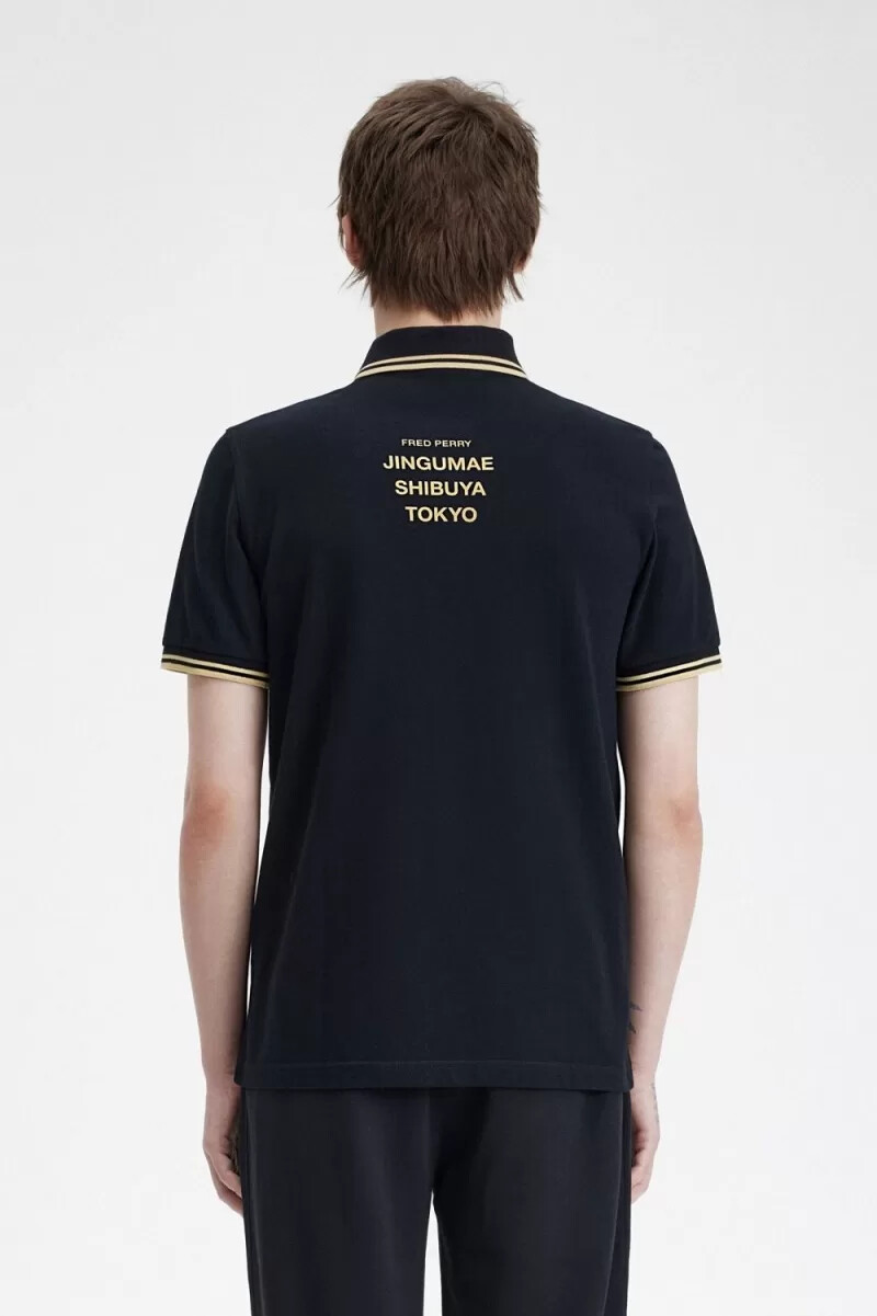 fred perry tokyo m12 mens polo shirt black champagne