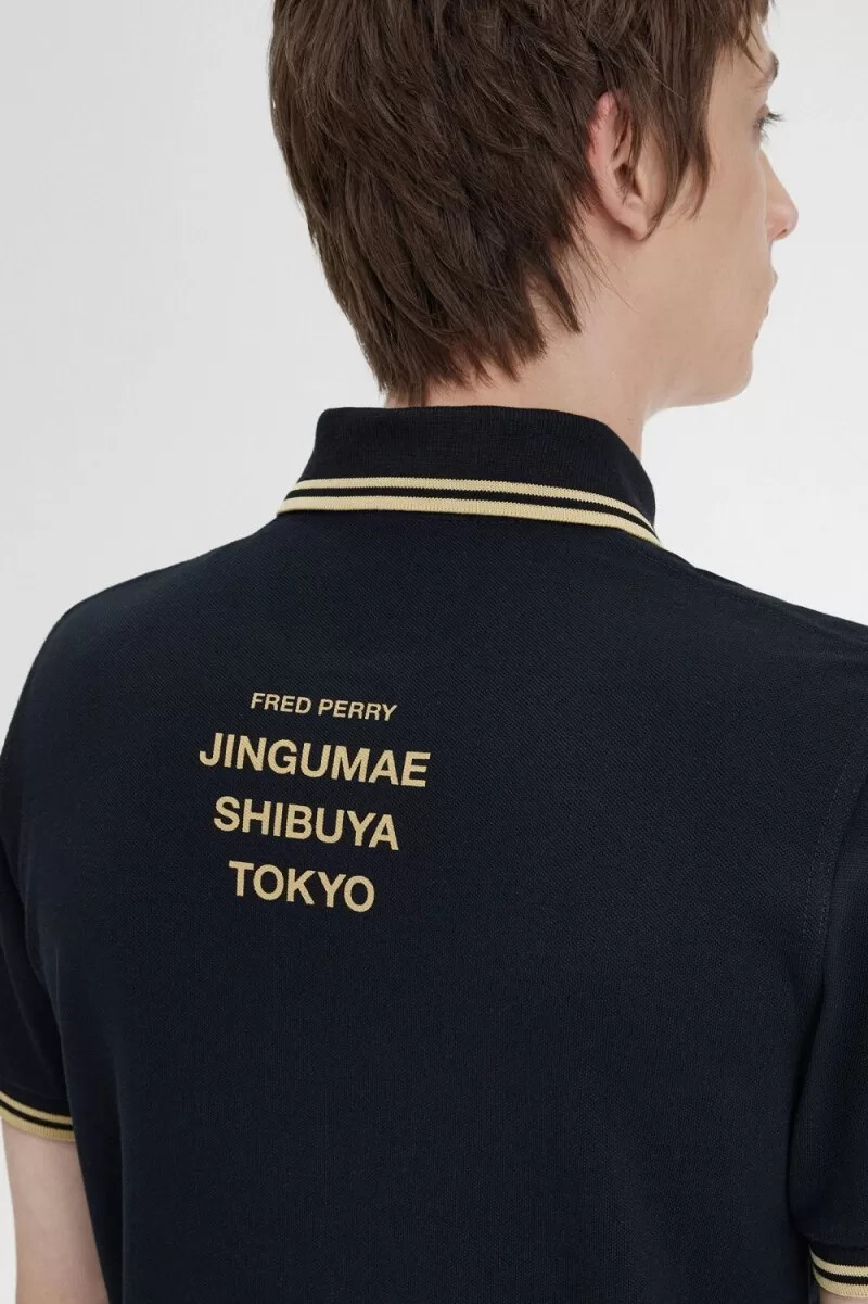 fred perry tokyo m12 mens polo shirt black champagne