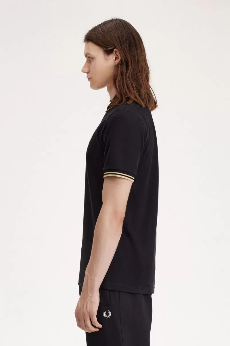 fred perry osaka m12 mens polo shirt black champagne
