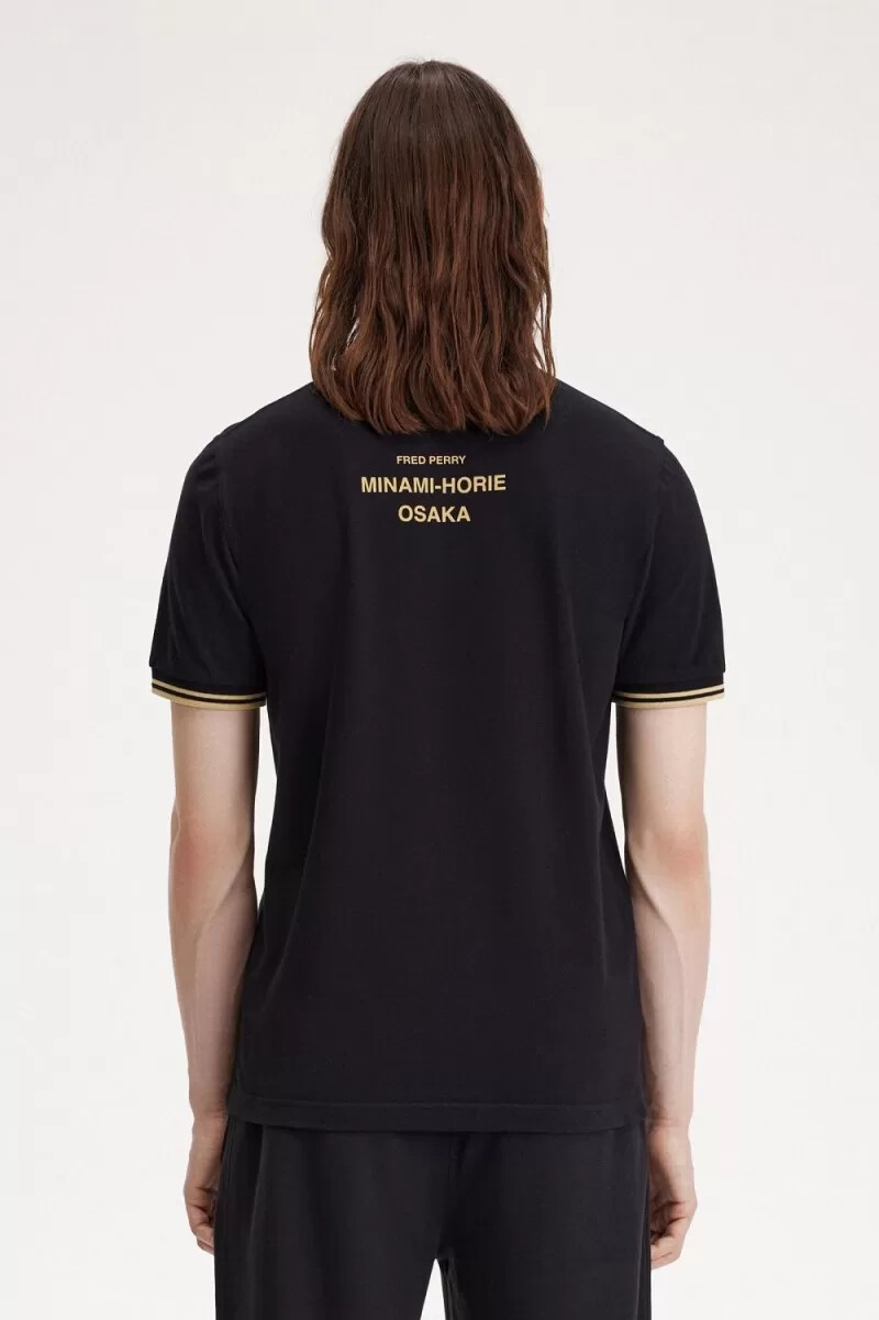fred perry osaka m12 mens polo shirt black champagne